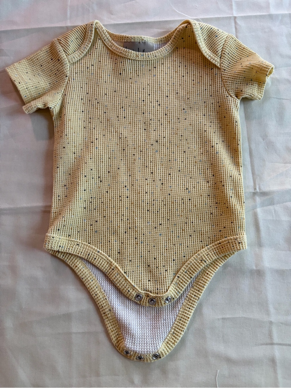 Nicole Miller Yellow Speckled Waffle-Knit Baby Bodysuit